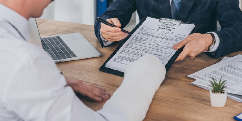 Does my employer have to hold my job while on workers comp in North Carolina?